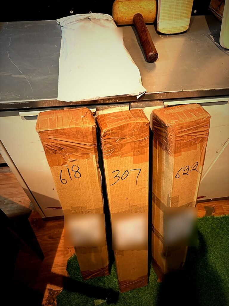Cricket bats packed in boxes for courier return
